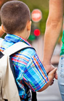 Young children should always be holding your hand around traffic